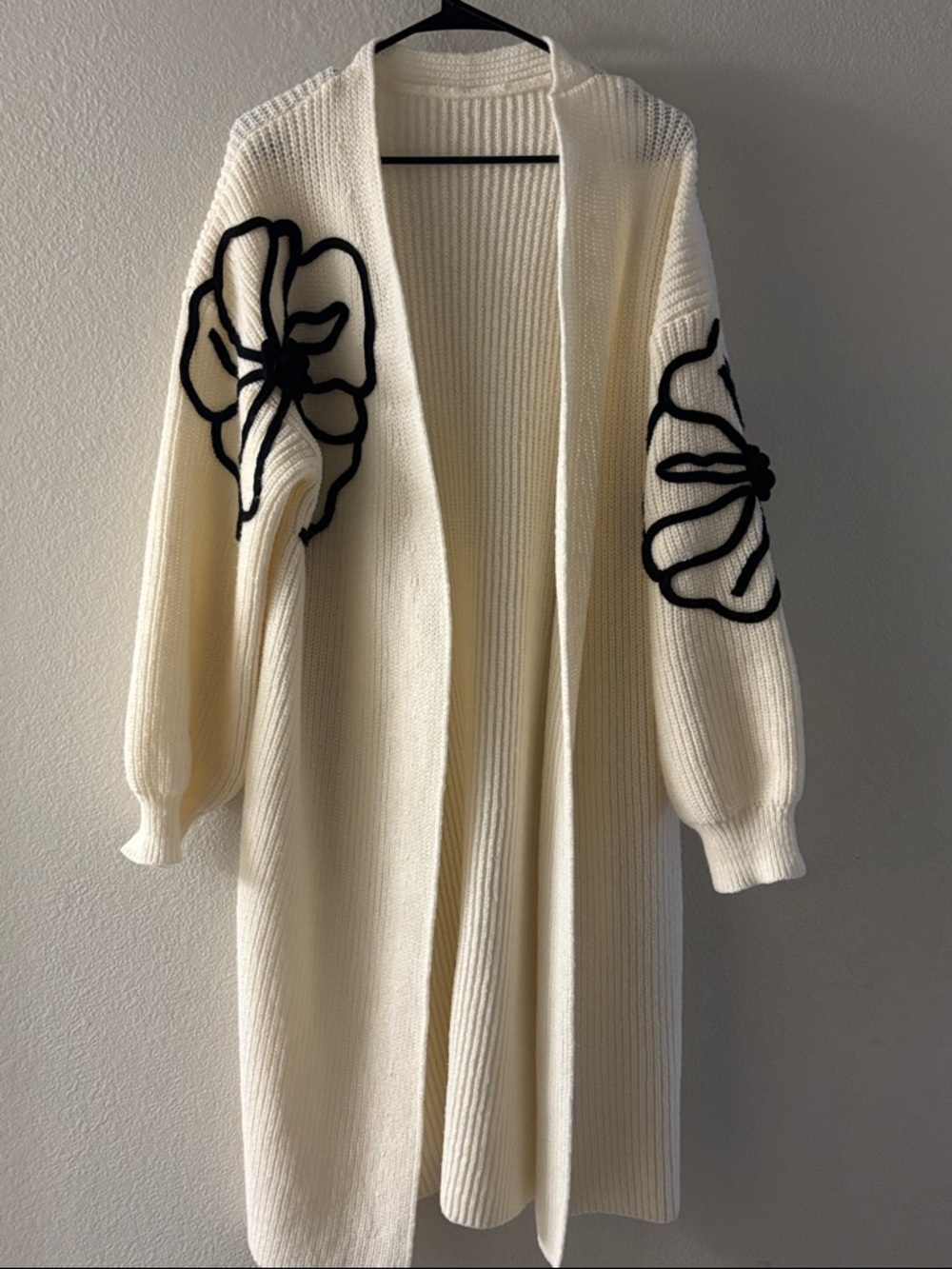 Open-Front Cream Long Knit Cardigan with Black Floral Appliqué